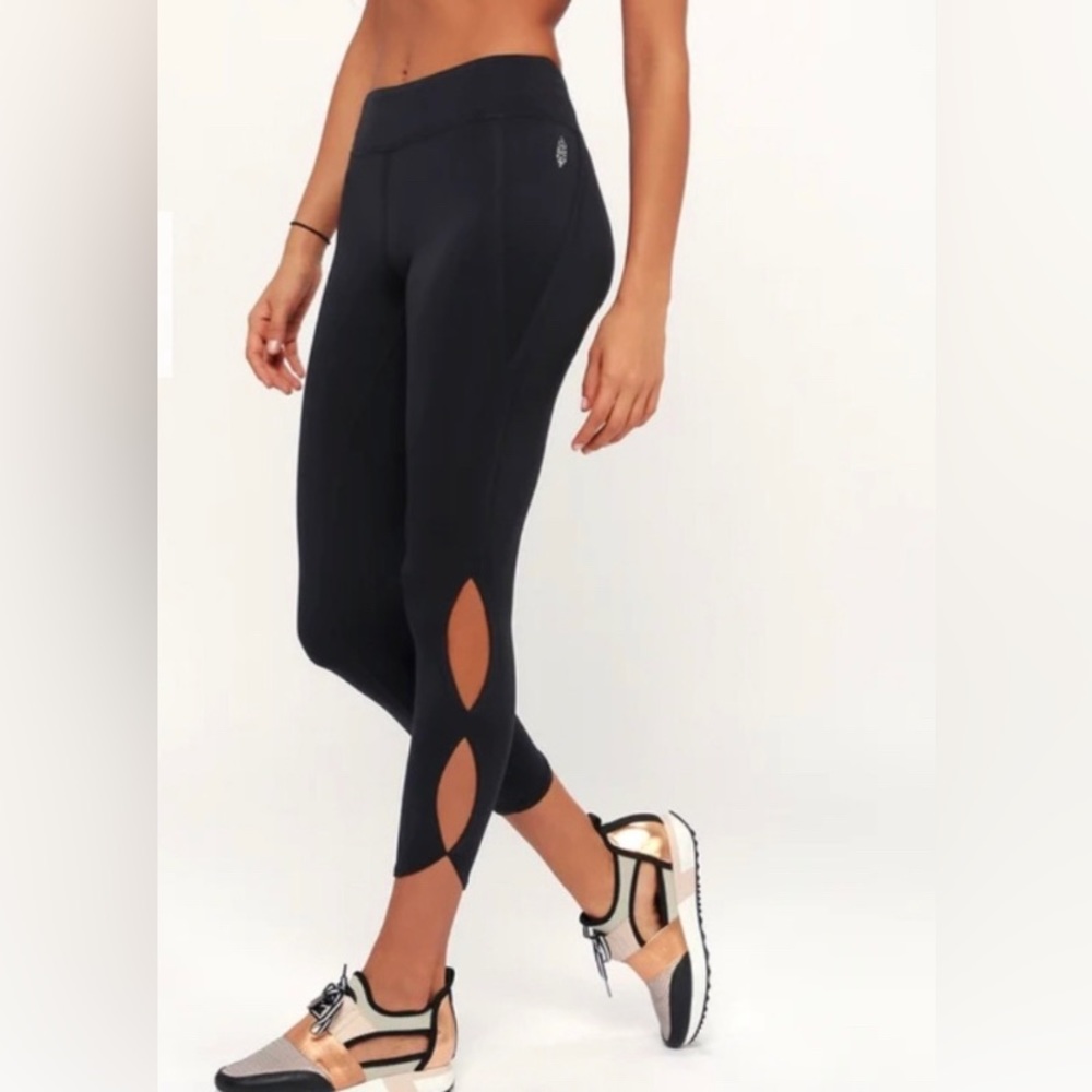Free people movement cropped legging with cutouts. Size large